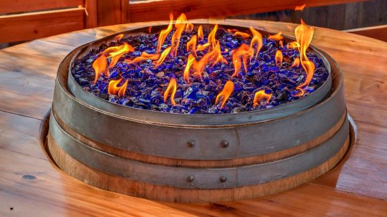 Cobalt Blue Crushed Fire Glass in Wine Barrel Fire Pit